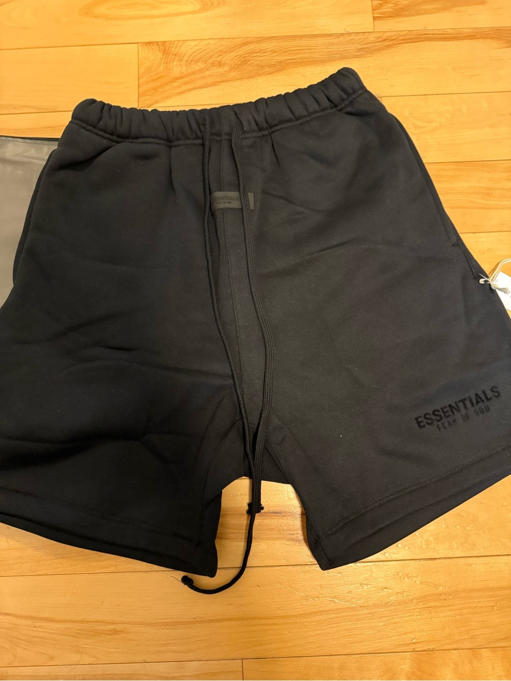 Black essentials fear of god shorts